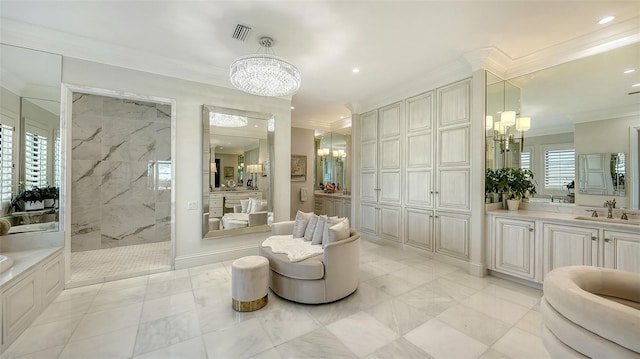 bathroom with plus walk in shower, vanity, an inviting chandelier, and ornamental molding