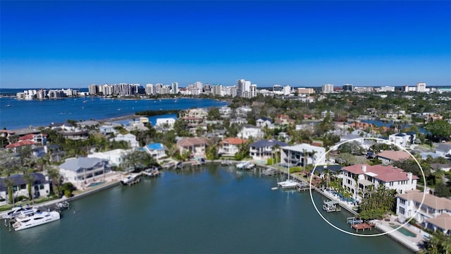 bird's eye view with a water view