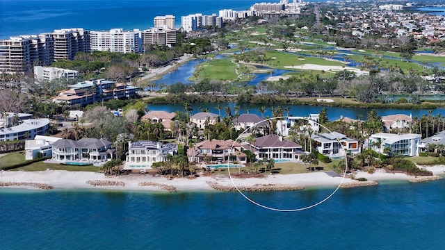 drone / aerial view with a view of the beach and a water view