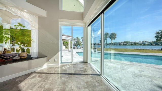 doorway featuring a water view