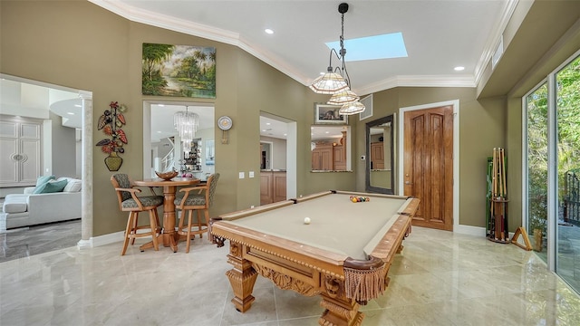 recreation room featuring pool table, a chandelier, vaulted ceiling, and ornamental molding