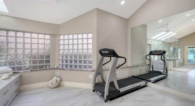 workout area featuring lofted ceiling and ceiling fan