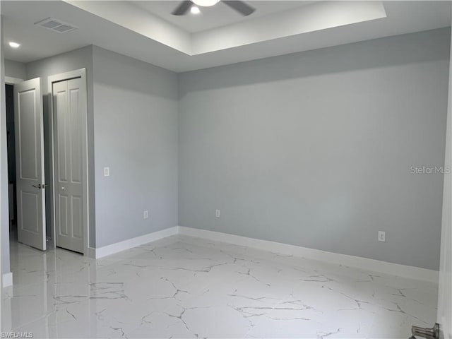 spare room featuring ceiling fan