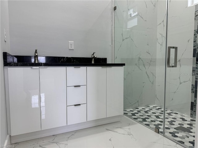 bathroom with vanity and walk in shower