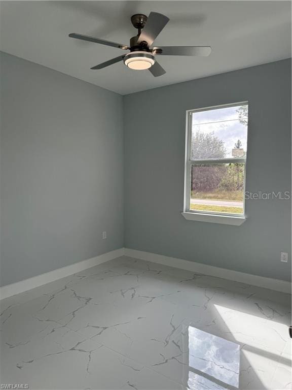 empty room with ceiling fan