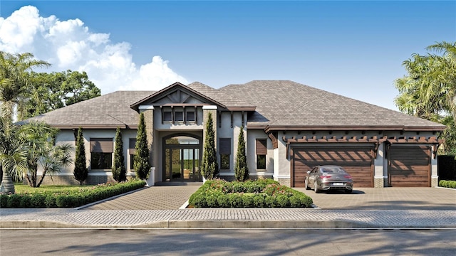 view of front of home featuring a garage and french doors