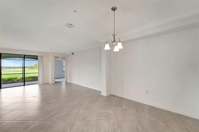 spare room featuring a chandelier, light tile patterned floors, and crown molding