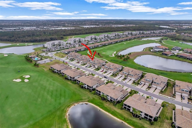 bird's eye view with a water view