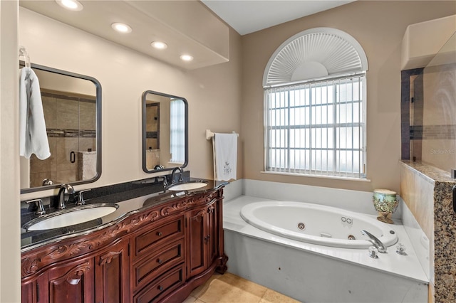 bathroom featuring vanity and plus walk in shower