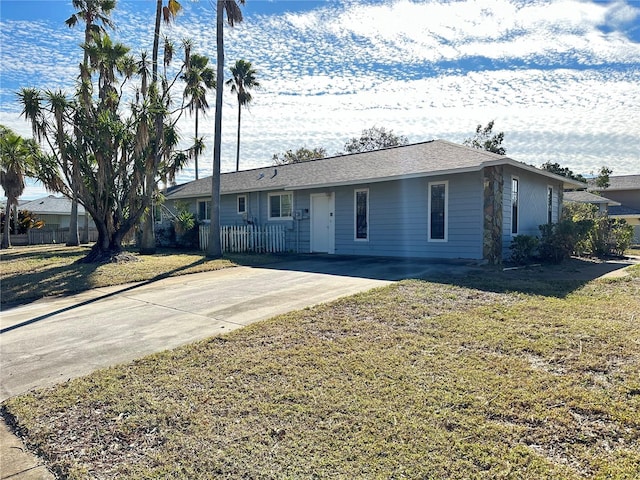 ranch-style house with a front yard