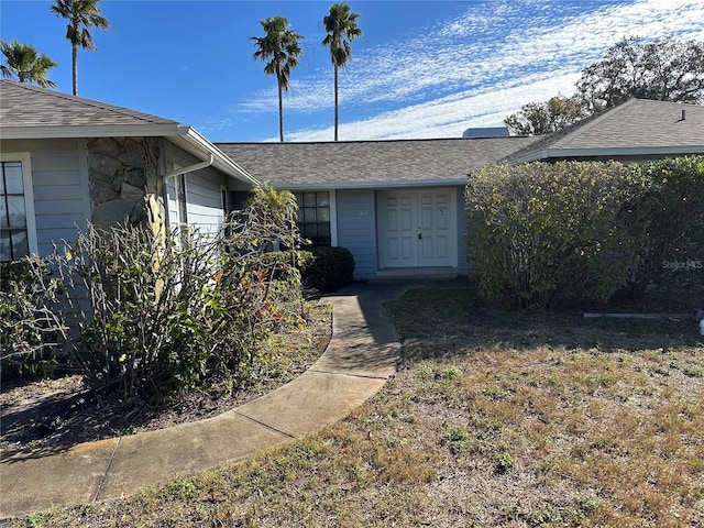 exterior space featuring a front lawn