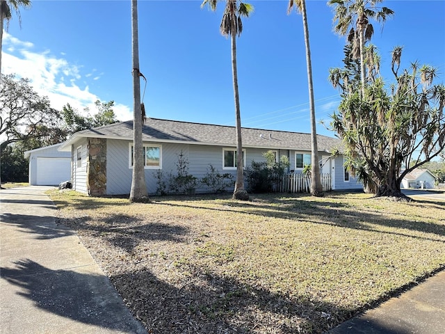 ranch-style house featuring a garage