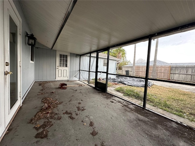 unfurnished sunroom featuring plenty of natural light