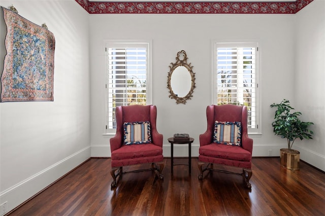 sitting room with dark hardwood / wood-style floors