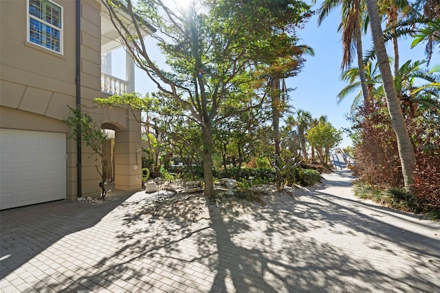 view of patio featuring a garage