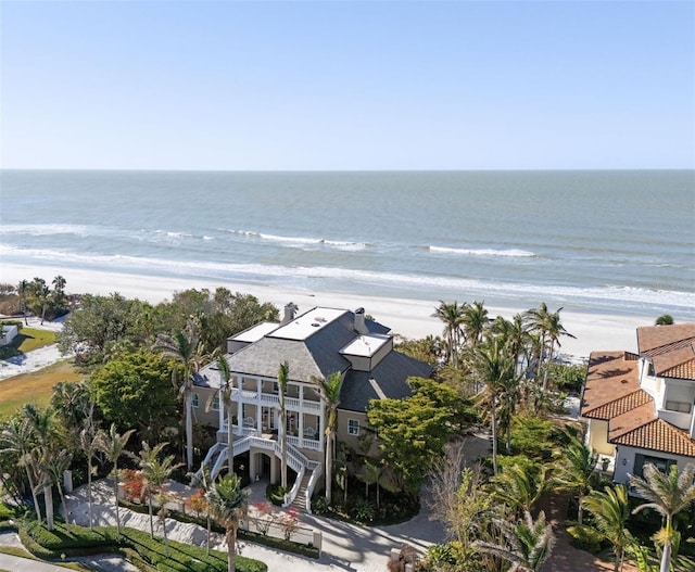 aerial view featuring a water view and a view of the beach