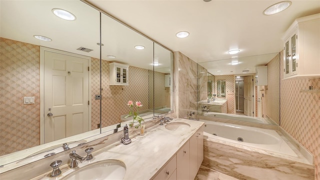 bathroom featuring plus walk in shower and vanity