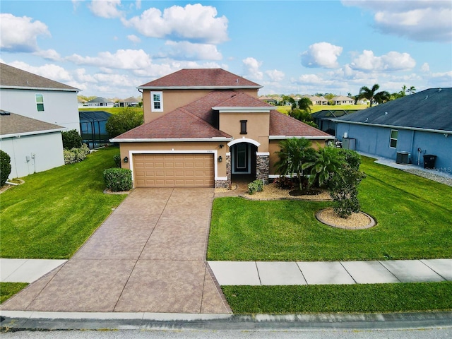 view of front of property with cooling unit, a front lawn, and a garage