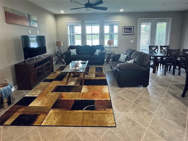 tiled living room featuring ceiling fan