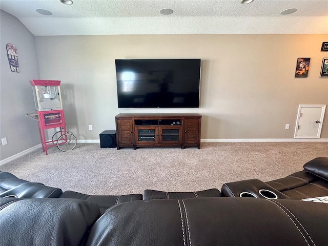 living room with carpet flooring, a textured ceiling, and vaulted ceiling