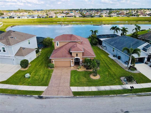 birds eye view of property featuring a water view