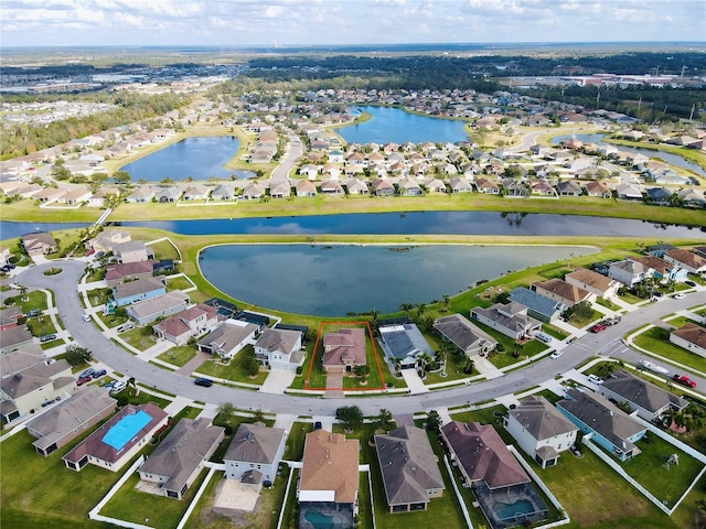 drone / aerial view with a water view