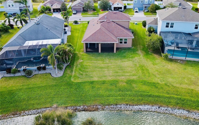 bird's eye view with a water view