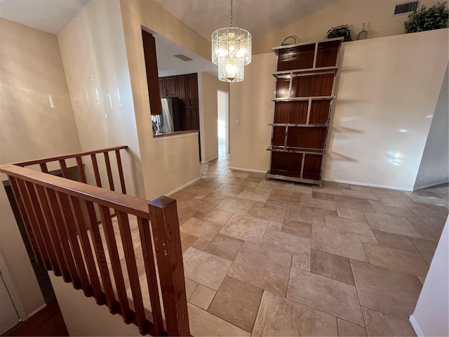 interior space featuring a chandelier