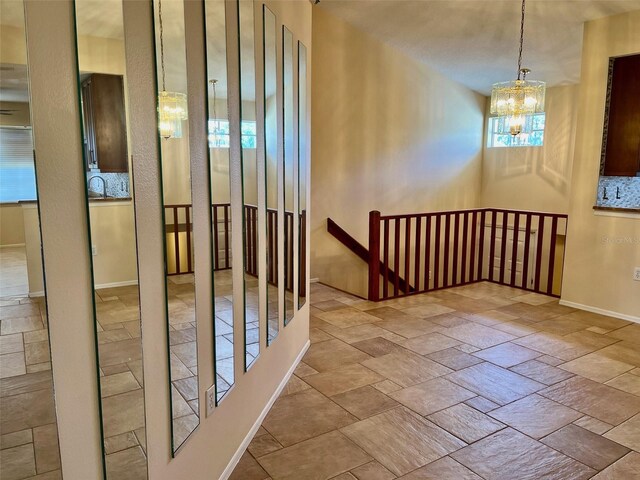 interior space featuring an inviting chandelier