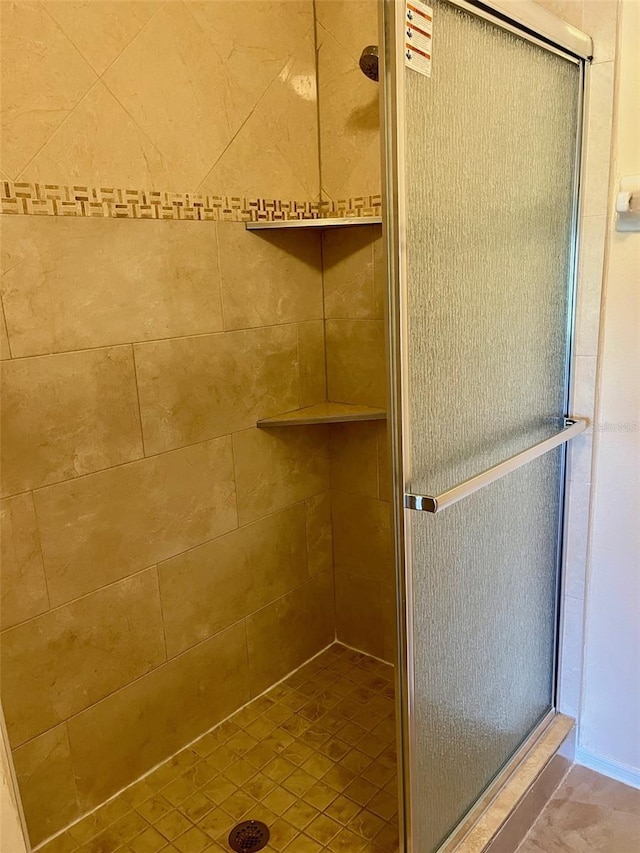 bathroom with an enclosed shower