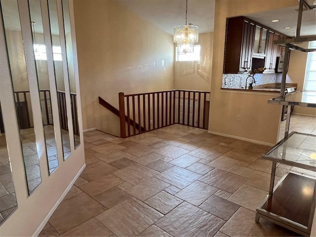 interior space with an inviting chandelier