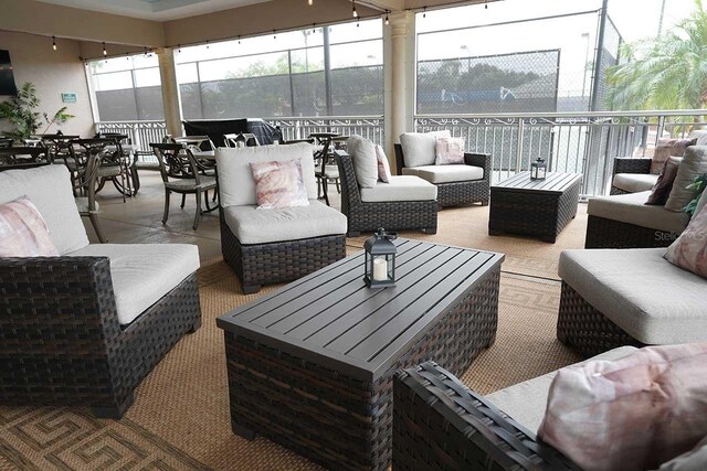 sunroom / solarium with a healthy amount of sunlight