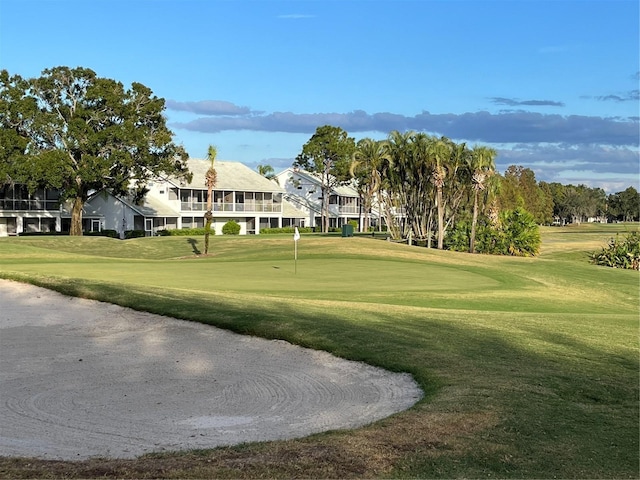 view of home's community with a lawn