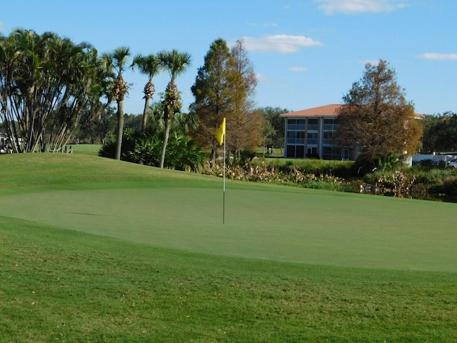 surrounding community featuring a yard