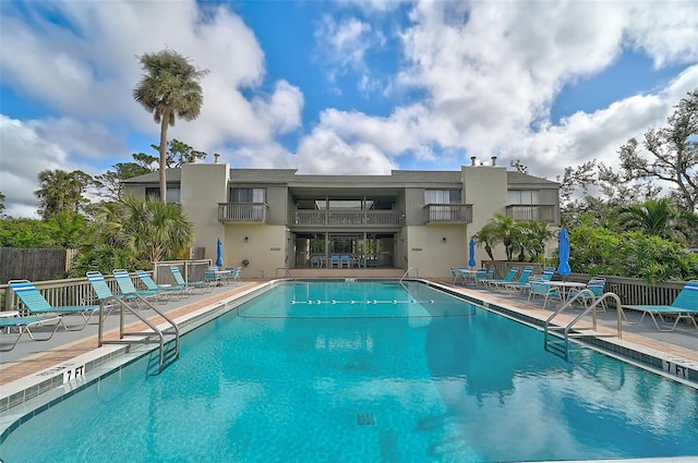 view of swimming pool with a patio area