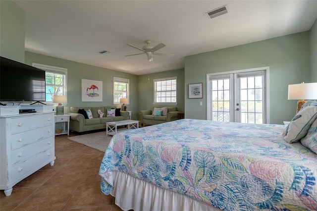 tiled bedroom featuring access to exterior, french doors, and ceiling fan