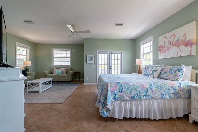 bedroom featuring access to exterior, french doors, multiple windows, and ceiling fan