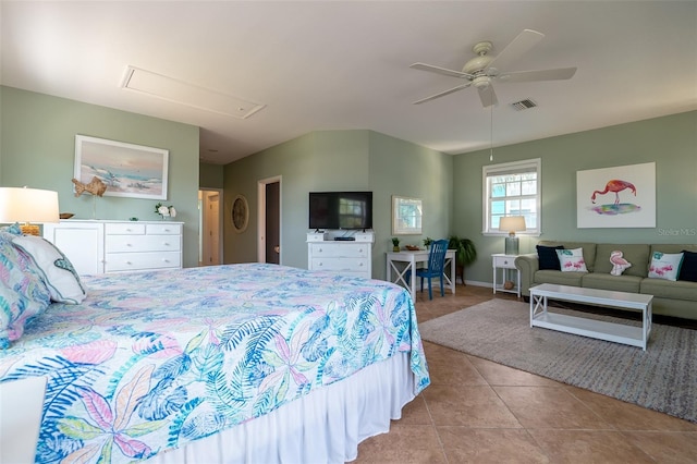 bedroom with ceiling fan and light tile patterned flooring