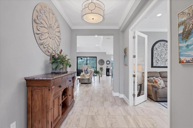 hall featuring french doors and crown molding