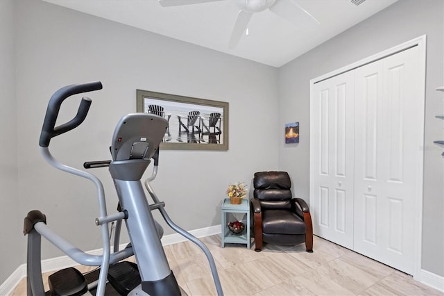 exercise room with ceiling fan