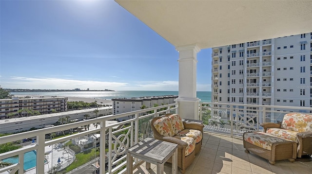 balcony featuring a water view