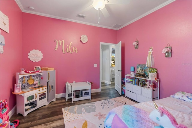 bedroom featuring dark hardwood / wood-style flooring, ceiling fan, and ornamental molding