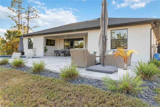 back of house featuring a patio