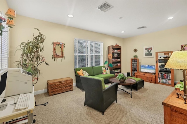 living room featuring light colored carpet