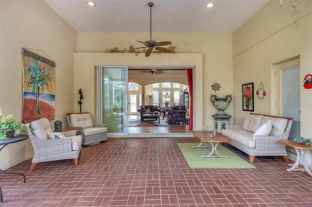 living room featuring ceiling fan