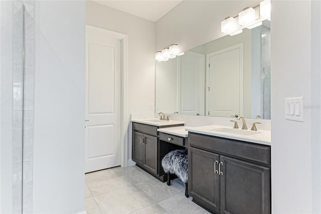 bathroom with vanity and tile patterned floors