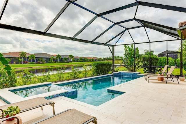 view of pool featuring a lanai, a patio area, and a water view