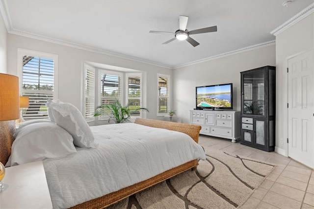 tiled bedroom with ornamental molding and ceiling fan