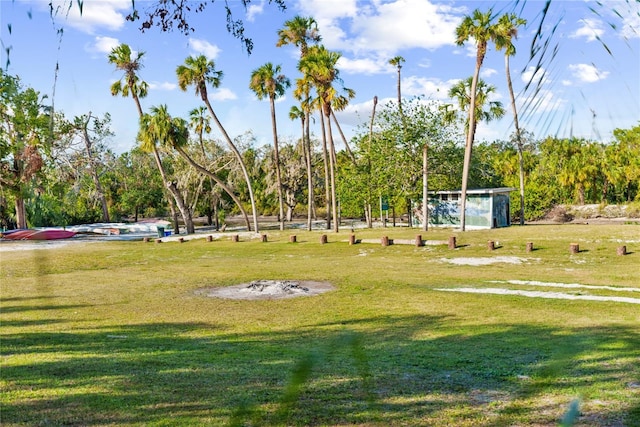 view of home's community featuring a lawn