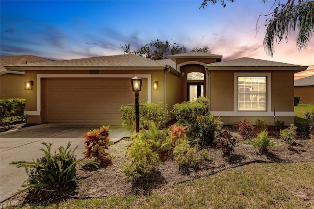 prairie-style house with a garage